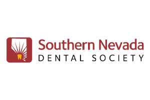 A maroon logo features a yellow tooth with white lines in a square, accompanied by text reading: “Southern Nevada Dental Society” against a transparent background.