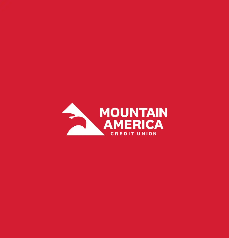 White logo with stylized mountain and eagle, accompanied by text "MOUNTAIN AMERICA CREDIT UNION" against a solid red background.