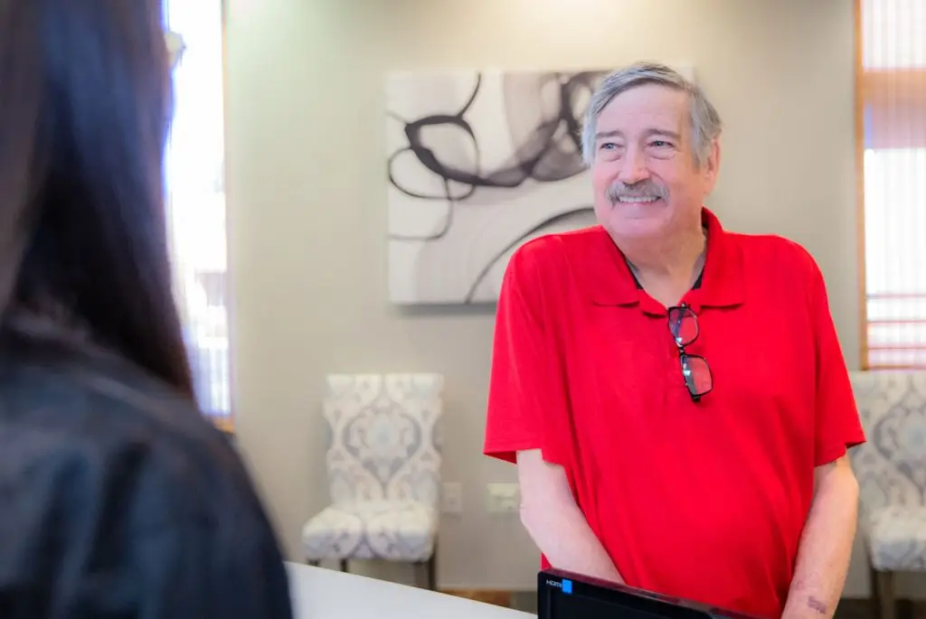 patient with sleep apnea getting help looking left